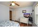 Bedroom with dark guitar next to a white dresser and a window providing natural light at 120 Mill Creek Ct, Acworth, GA 30101