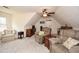 Spacious bonus room with comfortable seating, a ceiling fan, and plenty of room for activities at 120 Mill Creek Ct, Acworth, GA 30101