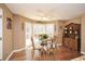 Bright breakfast nook with hardwood floors and a view of the deck and backyard at 120 Mill Creek Ct, Acworth, GA 30101