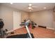 Home gym with treadmill, weight rack and workout space for fitness enthusiasts at 120 Mill Creek Ct, Acworth, GA 30101
