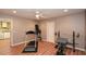 Home gym featuring exercise equipment and ample room for workouts at 120 Mill Creek Ct, Acworth, GA 30101