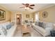 Comfortable living room with neutral tones and plush seating, filled with natural light at 120 Mill Creek Ct, Acworth, GA 30101