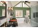 Luxurious main bathroom with soaking tub, dual vanities, walk-in shower, and abundant natural light at 120 Mill Creek Ct, Acworth, GA 30101