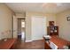 Home office featuring hardwood floors, neutral paint, and a closet for storage at 120 Mill Creek Ct, Acworth, GA 30101