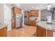Modern kitchen featuring stainless steel appliances, granite countertops and wooden cabinetry at 1765 Dew Pl, Marietta, GA 30064
