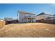 Expansive fenced backyard with a covered patio perfect for outdoor entertaining and relaxation at 3469 English Elm Way, Loganville, GA 30052