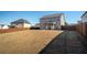 Spacious, fully fenced backyard offering ample space for recreation and outdoor activities at 3469 English Elm Way, Loganville, GA 30052