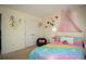 Charming bedroom with a canopy bed, decorative wall art, and cozy ambiance at 3469 English Elm Way, Loganville, GA 30052