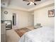 Comfortable main bedroom with ensuite bath, carpet floor, tray ceiling, and lots of light at 3469 English Elm Way, Loganville, GA 30052