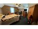 Bedroom with carpet, ceiling fan, and furniture at 705 Mill Creek Rdg, Woodstock, GA 30188