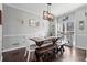 Dining room featuring a wood table and neutral walls at 303 Valley Green Ct, Woodstock, GA 30189