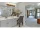 Bright bathroom featuring vanity and adjacent bedroom at 335 Lake Bluff Ct, Suwanee, GA 30024