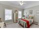 Inviting bedroom with carpet, natural lighting, and neutral walls at 335 Lake Bluff Ct, Suwanee, GA 30024