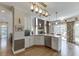 Eat-in kitchen featuring stainless appliances, granite countertops, and large windows at 335 Lake Bluff Ct, Suwanee, GA 30024