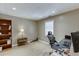 Home office features modern lighting, plank flooring, and neutral walls at 335 Lake Bluff Ct, Suwanee, GA 30024