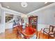 Formal dining room featuring hardwood floors, decorative lighting, and elegant furnishings, perfect for entertaining at 4020 Toulon Ln, Cumming, GA 30040
