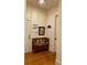 Inviting foyer with hardwood floors, bench, and convenient mail station for added functionality at 4020 Toulon Ln, Cumming, GA 30040