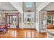 Elegant foyer with hardwood floors, high ceilings, and detailed trim work, leading to the living spaces at 4020 Toulon Ln, Cumming, GA 30040