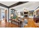 Open living space featuring a seating area, fireplace, staircase, and view to the kitchen at 4020 Toulon Ln, Cumming, GA 30040