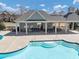 Relaxing poolside lounge with ample seating under a shaded structure near the community pool at 4020 Toulon Ln, Cumming, GA 30040