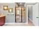 The main bathroom offers a standalone shower, a dual vanity, and ample space for a relaxing experience at 4020 Toulon Ln, Cumming, GA 30040