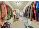Spacious walk-in closet with ample shelving and hanging space for optimal organization and storage at 4020 Toulon Ln, Cumming, GA 30040