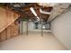 View of unfinished basement with concrete floor and walls at 4400 Huntington Cir, Dunwoody, GA 30338