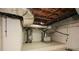 Unfinished basement area featuring water heater and utility equipment at 4400 Huntington Cir, Dunwoody, GA 30338