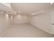 Spacious basement with neutral carpet, recessed lighting and plenty of room to customize at 4400 Huntington Cir, Dunwoody, GA 30338