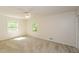 Bedroom with neutral carpet, ceiling fan, and plenty of natural light at 4400 Huntington Cir, Dunwoody, GA 30338
