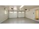 Two-car garage with ample space and clean epoxy flooring at 4400 Huntington Cir, Dunwoody, GA 30338