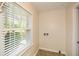 Bright laundry area filled with natural light from the window that looks out to the yard at 4400 Huntington Cir, Dunwoody, GA 30338