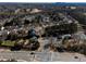 Wide aerial shot showcasing the community, including streets, homes, and natural surroundings at 509 Carrington Ct, Canton, GA 30115