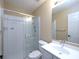 Bathroom features a glass-enclosed shower, modern fixtures and a well-lit vanity at 509 Carrington Ct, Canton, GA 30115