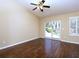 Bedroom with wood floors, sliding glass door leading to the outdoors, and natural light at 509 Carrington Ct, Canton, GA 30115
