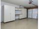 Organized garage space featuring ample storage cabinets and a functional work area at 509 Carrington Ct, Canton, GA 30115