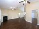 Large living room featuring hardwood floors, fireplace, vaulted ceiling and open space at 509 Carrington Ct, Canton, GA 30115