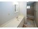 Bathroom featuring sink, vanity, and combination shower and tub at 165 Woodhaven Way, Alpharetta, GA 30009