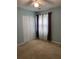 Bedroom with neutral paint, large closet, and natural light at 165 Woodhaven Way, Alpharetta, GA 30009