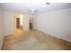 Spacious bedroom with neutral walls, carpet flooring, and ceiling fan at 165 Woodhaven Way, Alpharetta, GA 30009
