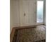Inviting entryway featuring a decorative rug, neutral walls, and a bright, welcoming ambiance at 165 Woodhaven Way, Alpharetta, GA 30009