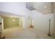 Spacious open living area with a fireplace, plush carpeting, and neutral walls offering room to relax at 165 Woodhaven Way, Alpharetta, GA 30009