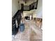 Renovation view of foyer with wood subfloor, view of staircase and open floor plan at 3200 Farmington, Vinings, GA 30339