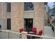 Back deck with patio furniture, a brick facade and steps to the yard at 3716 Stonewall Se Cir, Atlanta, GA 30339