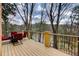 Outdoor deck with patio furniture overlooking beautiful trees at 3716 Stonewall Se Cir, Atlanta, GA 30339