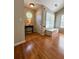 Inviting entryway showcasing hardwood floors and a cozy window seat at 3775 Pine Village Pl, Loganville, GA 30052