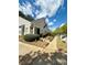 Beautiful home exterior with lush greenery and inviting curb appeal at 3775 Pine Village Pl, Loganville, GA 30052