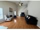 Spacious living room with vaulted ceiling, fireplace, and ample natural light at 3775 Pine Village Pl, Loganville, GA 30052