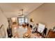 Sunlit living room showcases a high ceiling, fireplace, and plush seating arrangement at 3775 Pine Village Pl, Loganville, GA 30052