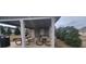 Community picnic pavilion with picnic tables and a trash can at 3775 Pine Village Pl, Loganville, GA 30052